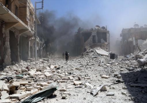 صورة أكثر من عشرة براميل على ريف حماة وثلاثة غارت على الباب بريف حلب