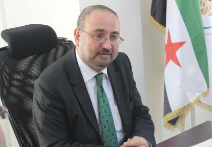 رئيس الحكومة المؤقتة أحمد طعمة إلى كرسي التقاعد