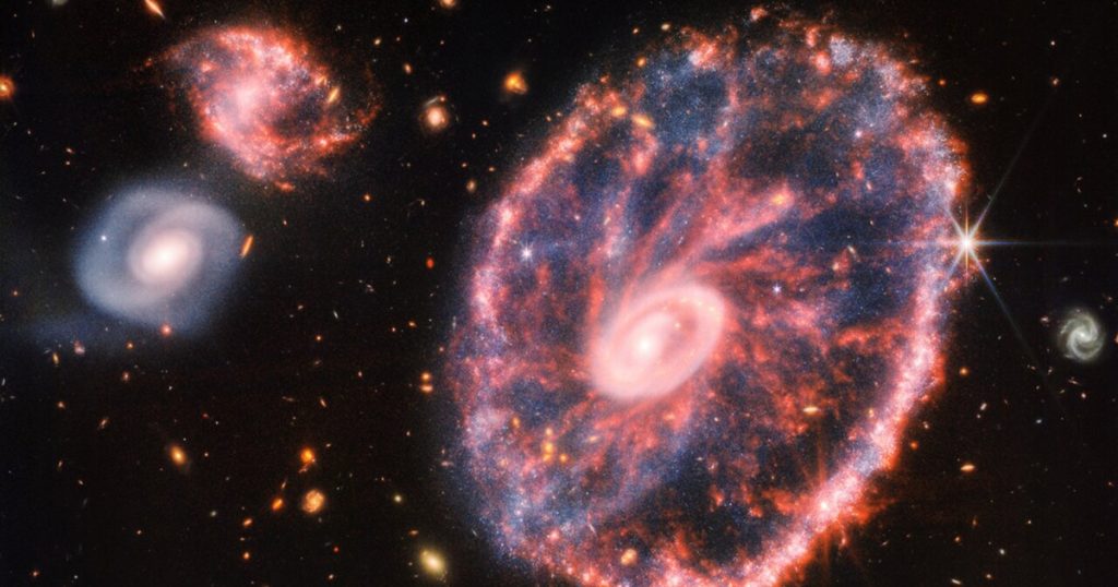 تلسكوب “جيمس ويب” يكشف أسرار مجرة “عجلة العربة”